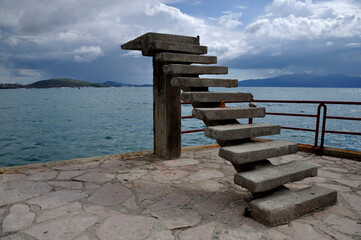 Obraz premium Abandoned Steps Leading Nowhere on the Coast of Sarandë, Albania