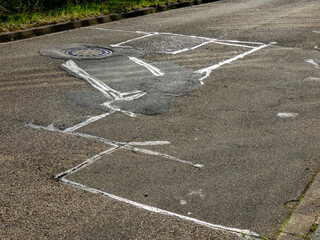 Strasse ausbessern mit Bitumen