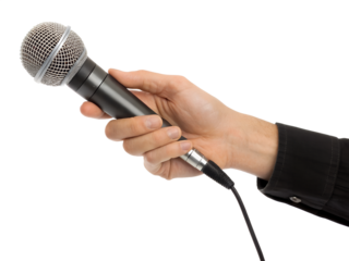 Music performance with a microphone held by a hand in clear focus