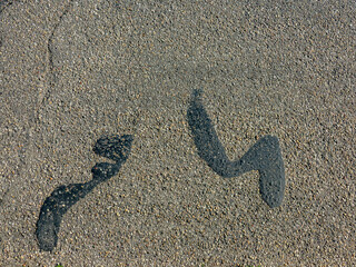 Strasse ausbessern mit Bitumen