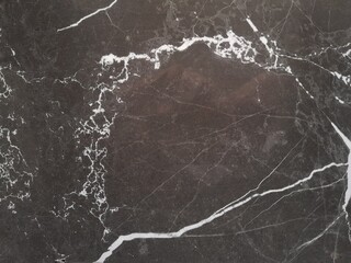 black and brown marble pattern background, decorated with intricate