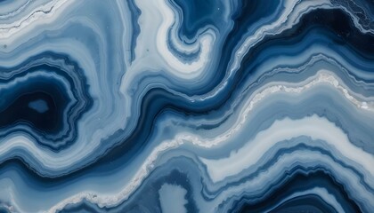 Obraz premium A high-angle close-up shot of blue agate stone, featuring a mesmerizing pattern of wavy lines and crackled textures