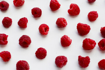 Fresh raspberry on white background.