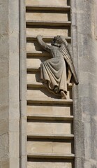 Climbing angel, statue of angel 