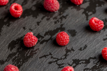 fresh red raspberries on the table