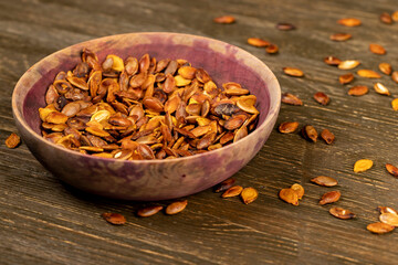 ripe pumpkin seeds fried to brown and golden