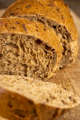 a healthy loaf of soft bread with added seeds and bran