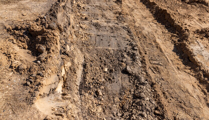 a deep hole in the ground on the site of which a highway was started