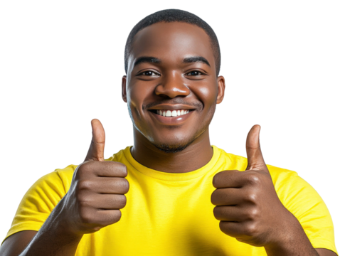 Cheerful young man giving double thumbs up in bright yellow shirt, expressing positivity and enthusiasm for success and happiness in life