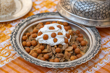 Kemeli Borani served in a copper plate, traditional Sanliurfa dish