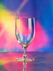 empty glass on colorful background