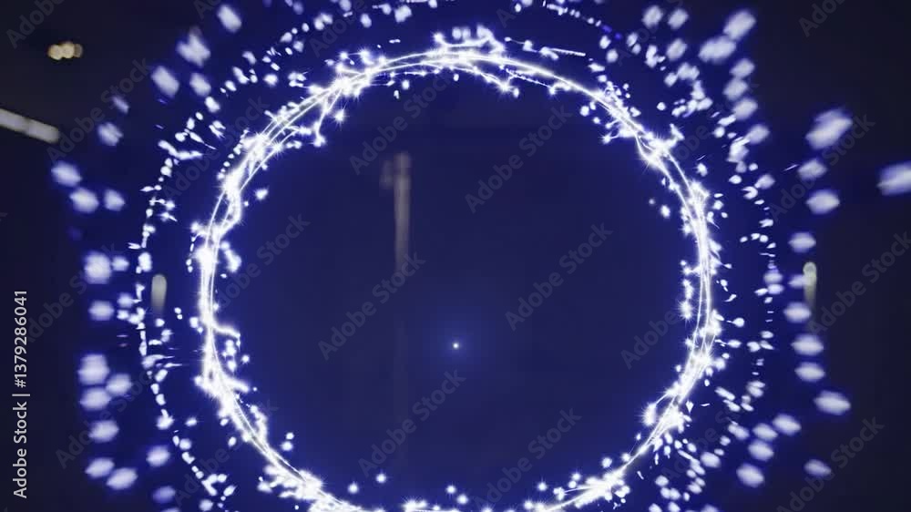 Poster abstract animation of a glowing particle ring expanding and contracting, creating a mesmerizing visu