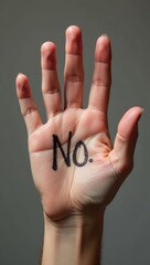Hand with 'No.' - Symbolic Abuse Protest. Ideal for anti-abuse campaigns, social issue websites, protest graphics, consent awareness advertisements