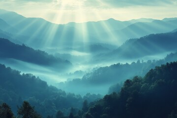 Sunlight breaking through the clouds over mountain valley