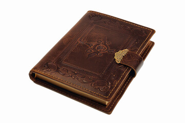 Fototapeta premium Elegant leather-bound journal with intricate design and clasp for secure closure, perfect for writing and notes