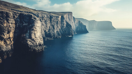 Majestic sea cliffs and deep blue coastline landscape