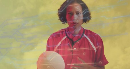 Person in red jersey holding soccer ball with digital network animation overlay - Powered by Adobe
