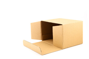 plain brown cardboard box with one lid open showing its spacious interior close-up isolated on white