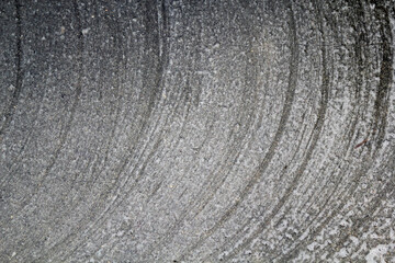 Concrete with curved lines close-up abstract textured background