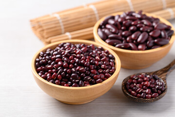 Azuki beans and red kidney beans in wooden bowl on white background, Food ingredient