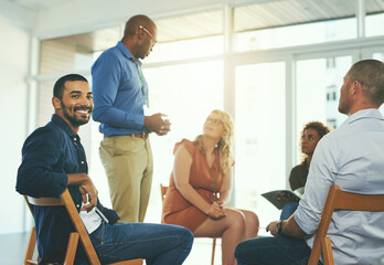 Obraz premium Office, startup and portrait of business man with staff for workshop, training and team building. Creative agency, meeting and happy worker for planning, collaboration and feedback in presentation