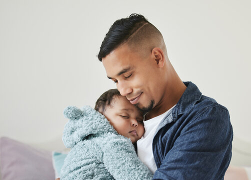 Father, baby sleeping and hug in home, love newborn and relax in nursery for parent bonding. Dad, infant nap and embrace kid for security in childhood, care and trust in papa for comfort connection