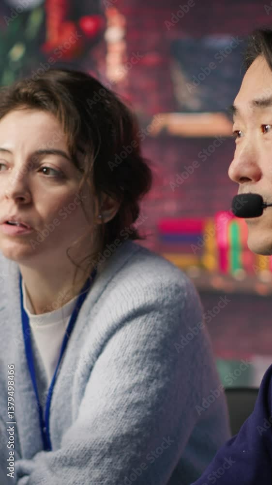Poster vertical video call center manager supervising work done by agent helping customers regain access to