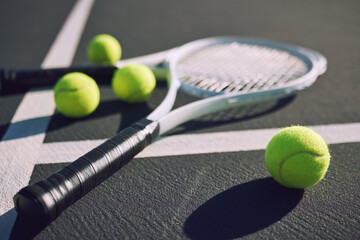 Fitness, tennis court and ball with racket on floor for tournament match, game and competition. Background, closeup and equipment for sports, exercise and training for practice, event and challenge