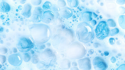 Close-up of light blue soapy bubbles and foam texture