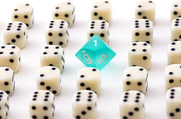 Turquoise D10 Die Standing Out Among Classic Dice on White