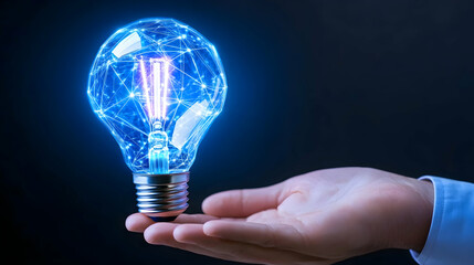 Glowing lightbulb in hand, symbolizing innovation and connection