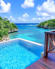 Infinity pool overlooking a tropical cove with turquoise water and lush greenery