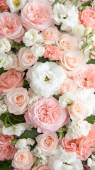 Obraz premium Lush arrangement of pink and white roses, carnations, and lisianthus