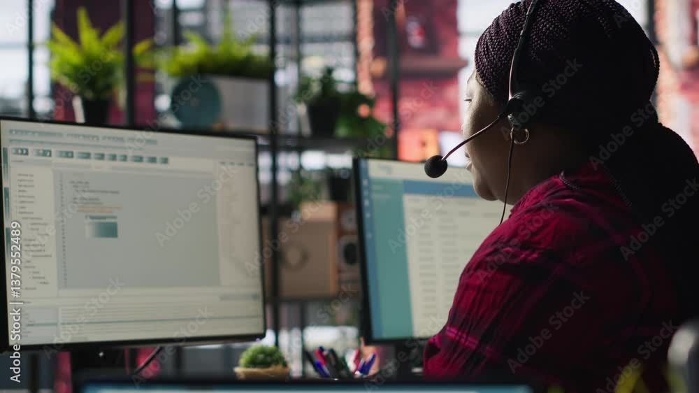 Poster it support specialist at pc in office helping customers during call, troubleshooting errors. tech su