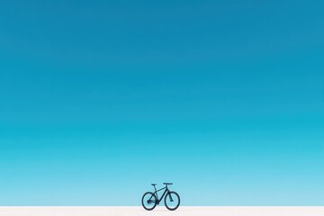 Fototapeta premium lone bicycle set against vast open landscape invites thoughts of freedom and exploration
