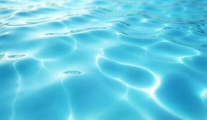 Fototapeta premium close-up of clear blue water surface, natural ripples spread on the water surface, sunlight reflects off it and gives it a beautiful shine