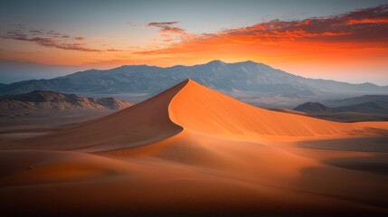 Naklejka premium Sunrise over a sand dune
