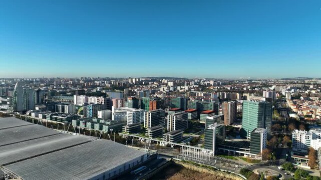 Establishing drone shot of condos in the Parque das Na&ccedil;&otilde;es district, in Lisbon