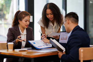 Financial Business analyze the graph of the company's performance to create profits and growth, Market research reports and income statistics, Financial and Accounting meeting concept.	
