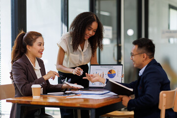 Financial Business analyze the graph of the company's performance to create profits and growth, Market research reports and income statistics, Financial and Accounting meeting concept.	
