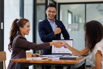 Business handshake for teamwork of business merger and acquisition,successful negotiate,hand shake,two businessman shake hand with partner to celebration partnership and business deal concept
