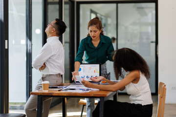  teamwork of tired young business with documents tax laptop computer in office. Sad, unhappy, Worried, Depression, or employee life stress concept
