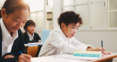 Japanese, children and writing for education in classroom, creative learning and art assessment of...