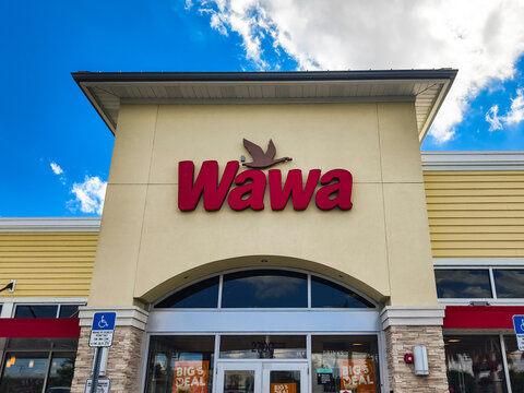 Miami Gardens, Florida: Feb 26, 2024 - Exterior view of Wawa store showing its iconic signage and entry area.