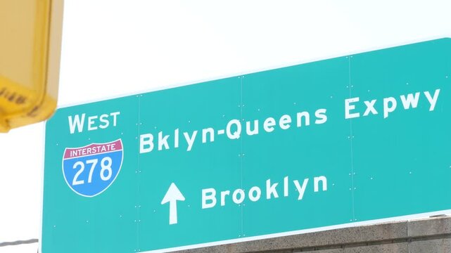 Brooklyn Queens expressway road sign, New York City highway signage, green traffic roadsign shield, United States transportation.