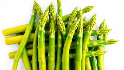 Obraz premium Asparagus pile on white background