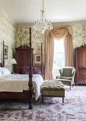Fototapeta premium Elegantly Furnished Traditional Bedroom in Historic Mansion with Ornate Chandelier and Curtains