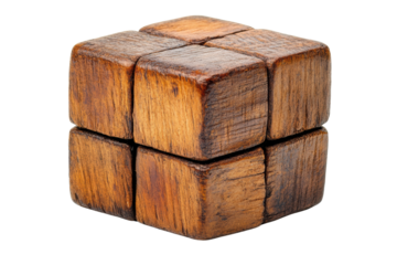 A close-up view of a vintage wooden puzzle cube on a white isolate background.
