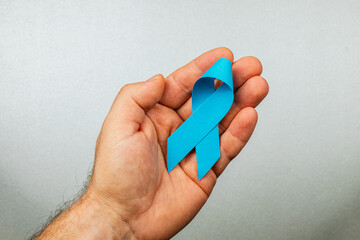 Supporting awareness for colorectal cancer with a blue ribbon display