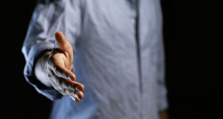 Businessman reaching out to shake hands, offer or welcome, recruitment and deal or thank you, introduction in meeting, support and greeting at job interview. 